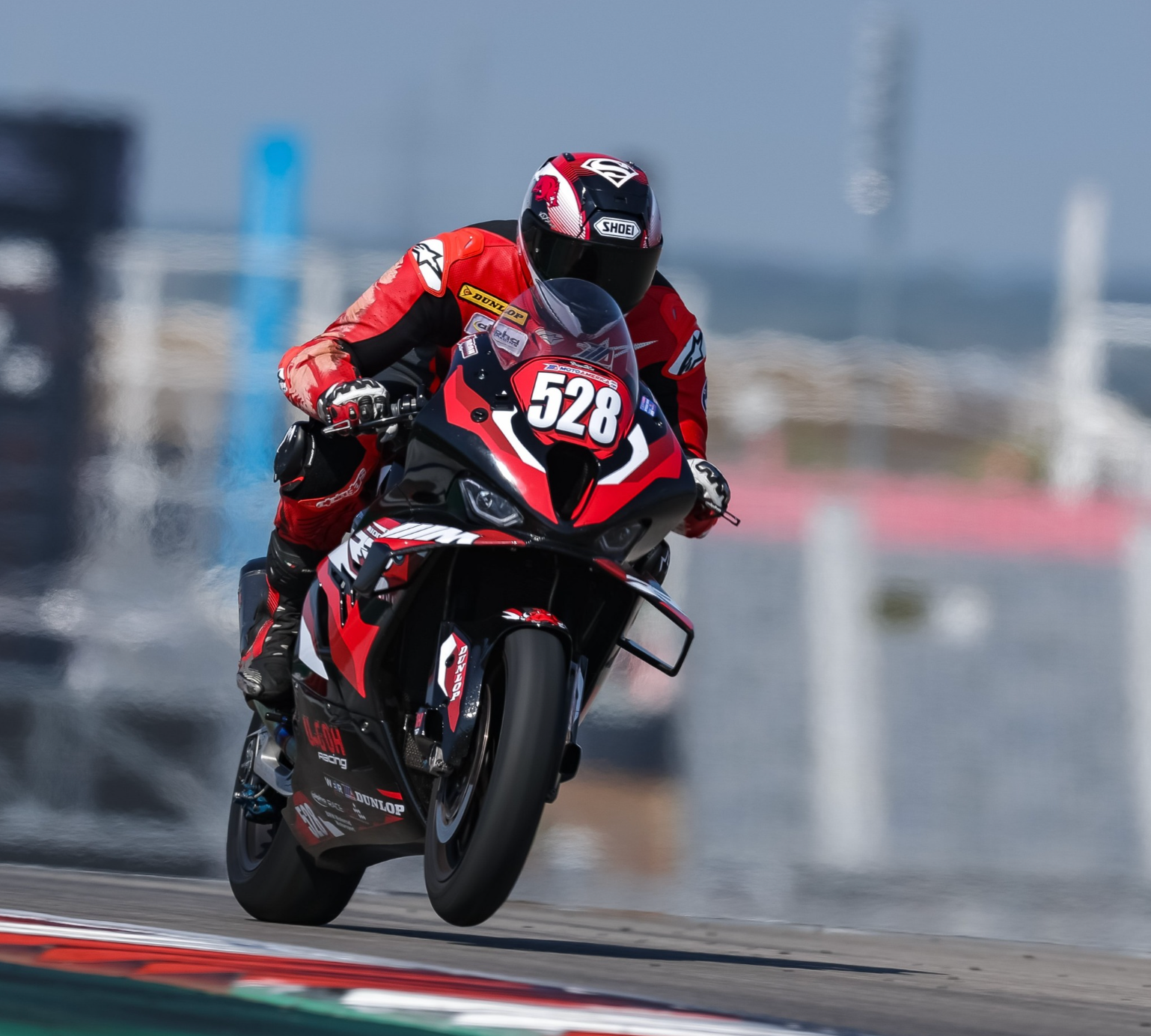 Tony Ugoh BMW M1000 RR, ex NFL motociclismo, BMW M1000 RR specs, superbike BMW M1000RR, Tony Ugoh Superbikes, motocicletas deportivas BMW, NFL jugador motociclista, BMW Motorrad M1000 RR, Tony Ugoh carrera motos, BMW M1000 RR velocidad máxima